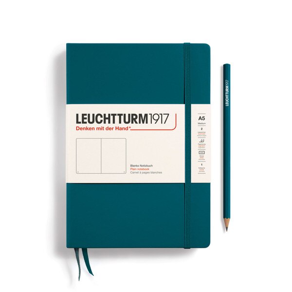 A pacific green colored hardcover notebook.